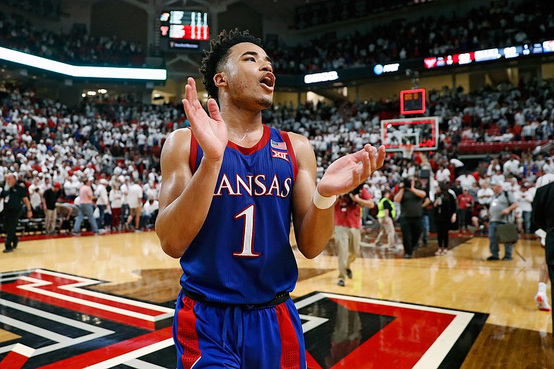 In this March 7 file photo, Kansas' Devon Dotson celebrates after a game against Texas Tech in Lubbock, Texas. 