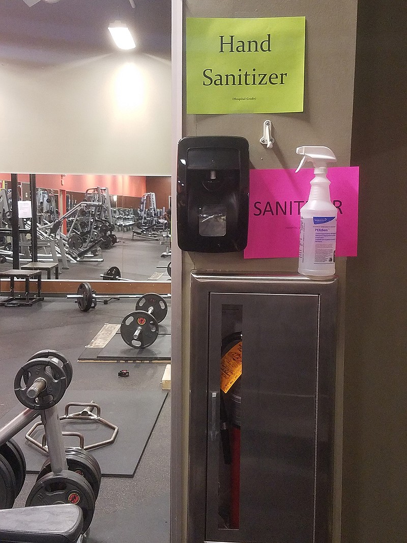 A sanitation station for Gym Box members is near the free weights so guests can clean equipment and sanitize their hands. Gym Box has color-coordinated sanitizers by type and have sanitation stations throughout the gym, entry and exit, and locker and bathrooms. Gym Box employees also do regular cleanings throughout the day.