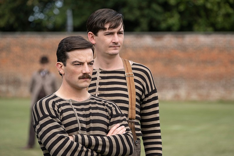 This image released by Netflix shows Kevin Guthrie, foreground, in a scene from "The British Game," a six-part drama charting the origins of soccer. (Oliver Upton/Netflix via AP)