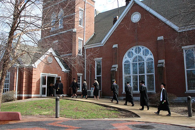 Seniors at William Woods University file Thursday, March 19, 2020, into a closed commencement ceremony. The university canceled its traditional ceremony. (Fulton Sun photo)