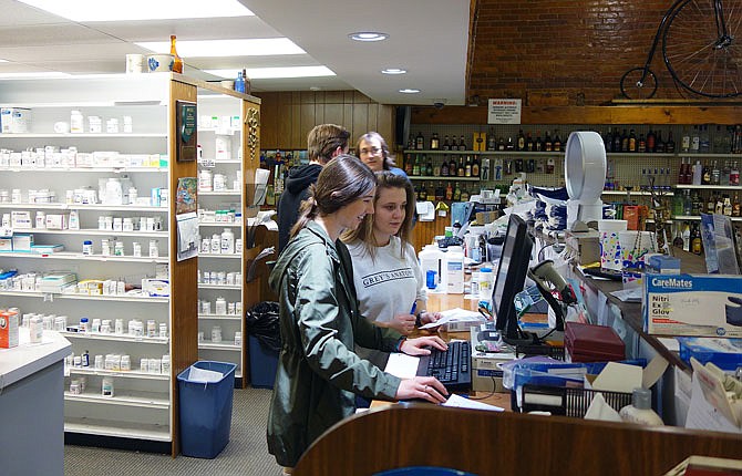 Times are tight at many locally owned businesses in Callaway County. Grocery stores and pharmacies are an exception — employees at Saults Drug in downtown Fulton were busier than ever Friday afternoon.