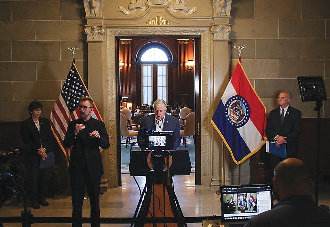 Gov. Mike Parson gives the daily coronavirus press briefing on Saturday at the Missouri Capitol. There will be no press briefing on Sunday, but the briefings will resume Monday.