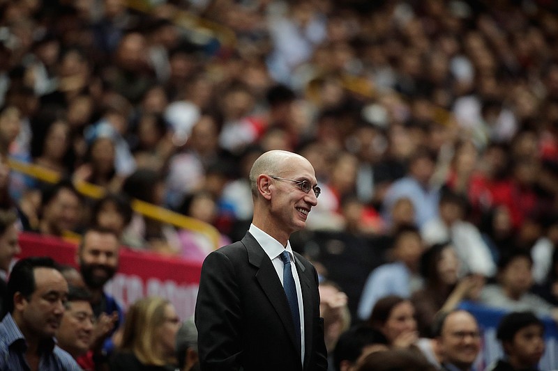 In this Oct. 8, 2019 file photo, NBA Commissioner Adam Silver is introduced during an NBA preseason basketball game between the Houston Rockets and the Toronto Raptors in Saitama, near Tokyo.  Silver said in an interview Saturday, March 21, 2020  that the league is considering all options, best-case, worst-case and countless ideas in between,  as it tries to come to grips with the coronavirus pandemic. (AP Photo/Jae C. Hong, File)