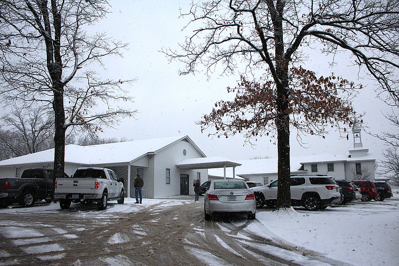 Congregants stay in their cars Sunday for Ebenezer Baptist Church's first drive-in service. 