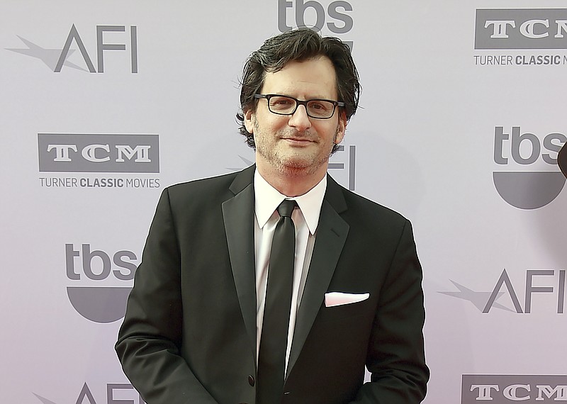 FILE - This June 4, 2015 file photo shows Ben Mankiewicz at the 43rd AFI Lifetime Achievement Award Tribute Gala in Los Angeles. The 2020 TCM Classic Film Festival may have been canceled, but the film-loving folks at Turner Classic Movies have decided to air classic films like “Singin’ in the Rain,” “Casablanca” and “North by Northwest” as well as interviews with from festival past with film legends from Peter O'Toole to Faye Dunaway. “I got emotional when we made the announcement to cancel. The festival means something to us,” said TCM host Ben Mankiewicz of the March 12 decision. “We all just sensed that we had to do something.” (Photo by Jordan Strauss/Invision/AP, File)