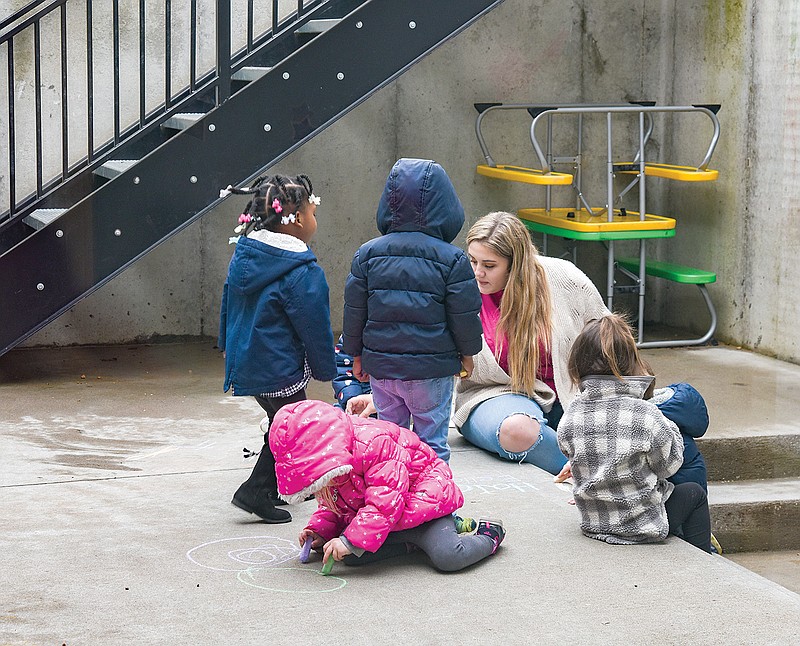 Students and a teacher are seen at Fountain of Life Worship Center on Grant Street. Fountain of Life is able to offer child care to additional families.