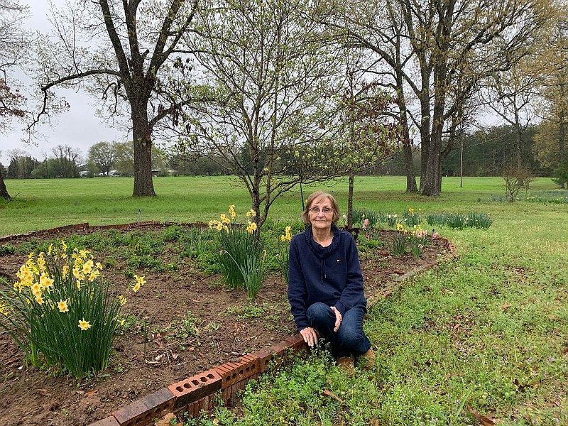Georgia McFaul sits beside one of her flower beds at her home in the Liberty-Eylau community of Texarkana, Texas. McFaul, who retired after decades of working as an educator, continues to use her time helping others, including volunteering as a receptionist at Domestic Violence Prevention. (Submitted photo)
