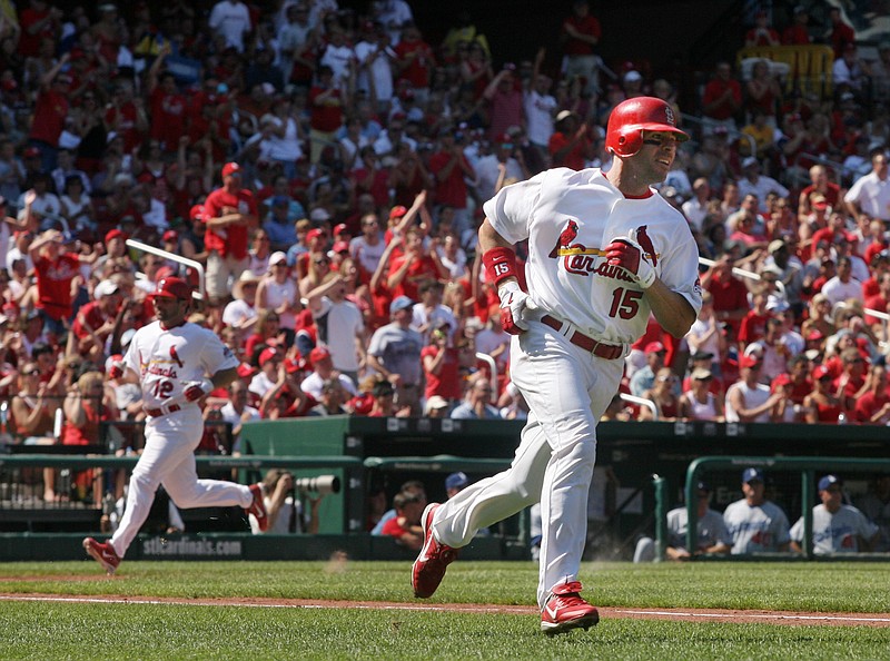 The St. Louis Cardinals' Jim Edmonds (15) runs to first base with a two-run single against the Los Angeles Dodgers at Busch Stadium in St. Louis on August 11, 2007. (Chris Lee/St. Louis Post-Dispatch/TNS)