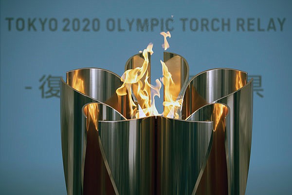 The Olympic flame burns during a ceremony last week in Fukushima City, northern Japan.
