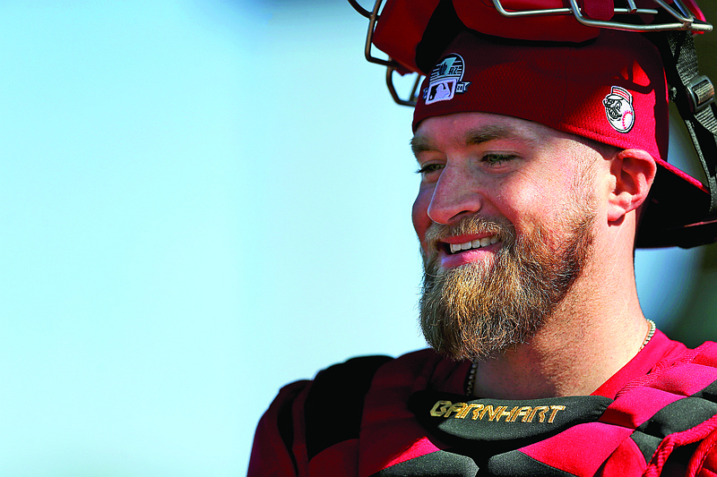 Reds catcher Tucker Barnhart smiles following a bullpen session during spring training last month at the Reds' spring training facility in Goodyear, Ariz.