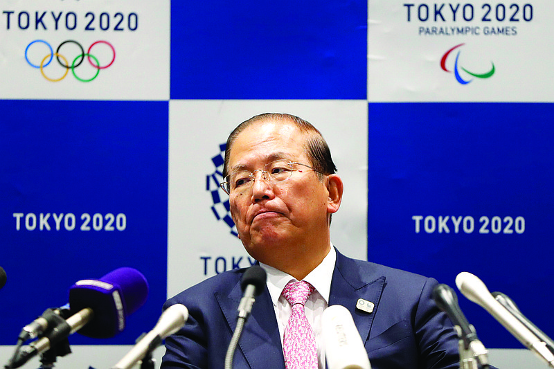 Tokyo 2020 Organizing Committee CEO Toshiro Muto sits a news conference after a Tokyo 2020 Executive Board Meeting on Monday in Tokyo.