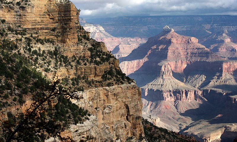 This Oct. 22, 2012, file photo, shows a view from the South Rim of the Grand Canyon National Park in Ariz. Calls are mounting for the federal government to close Grand Canyon National Park after a resident of the iconic park tested positive for the coronavirus and has been in isolation. Members of Congress and city, county and tribal officials have urged the Interior Department to approve a request from the park to close. The Park Service has been deciding whether to shut down individual sites on a park-by-park basis, in consultation with state and local health officials. Neither the Interior Department nor the Park Service immediately responded to requests Tuesday, March 31, 2020, on the status of the Grand Canyon's request. (AP Photo/Rick Bowmer, File)