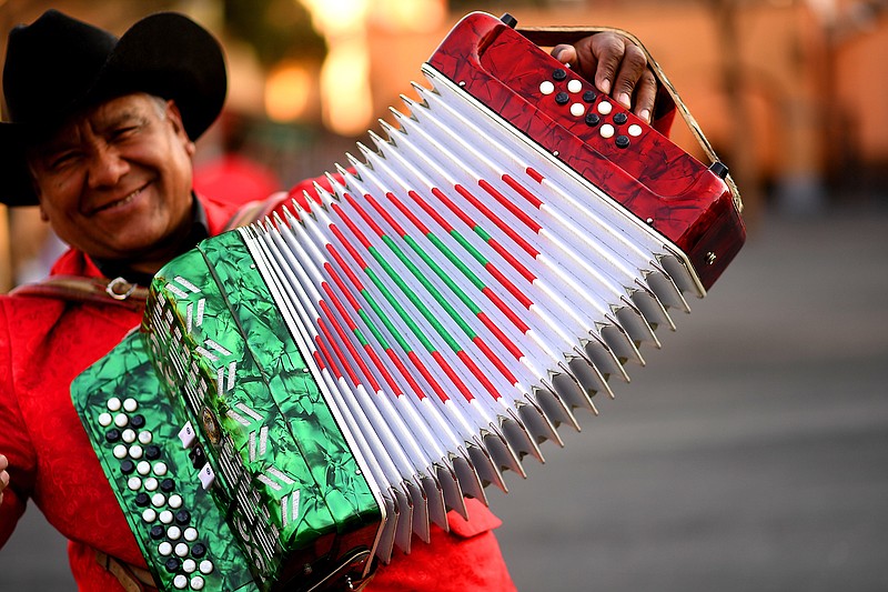 People make your photos much more interest, like this Mariachi player performing at Plaza Girabaldi in Mexcio City on Feb. 20, 2018. Ask their permission first, though. (Wally Skalij/Los Angeles Times/TNS) 
