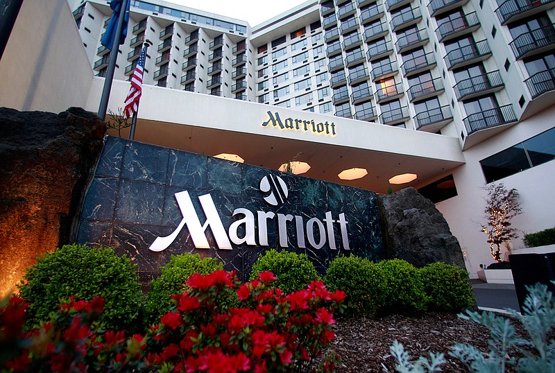 This April 20, 2011 file photo shows Portland Marriott Downtown Waterfront in Portland, Ore.  Marriott says guests' names, loyalty account information and other personal details may have been accessed in the second major data breach to hit the company in less than two years. The world's largest hotel company says on Tuesday, March 31, 2020, approximately 5.2 million guests may have been affected.  (AP Photo/Rick Bowmer, File)