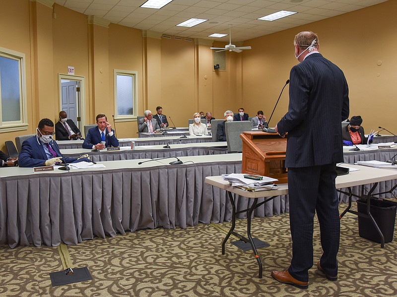 Julie Smith/News Tribune
Dan Haug, State Budget Director, addresses members of the  Senate’s Appropriations committee about the budget bill. The committee met in the first floor where cameras were used to broadcast to reporters and the public who were not in the Capitol.