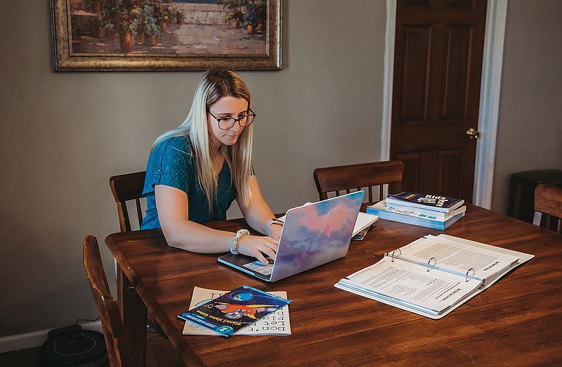 Lincoln University student Alexandria Schaefer does classwork online from her home. She began student teaching at Blair Oaks Elementary School this semester, but she now has to finish her student-teaching requirements online while Missouri's public schools remain closed.