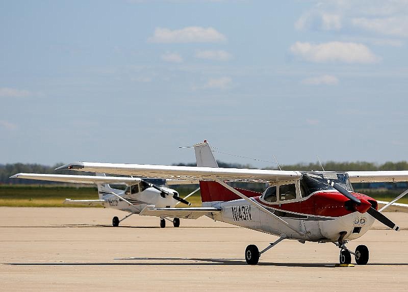 Planes sit idle Tuesday, April 14, 2020, on the grounds of the Jefferson City Memorial Airport. 