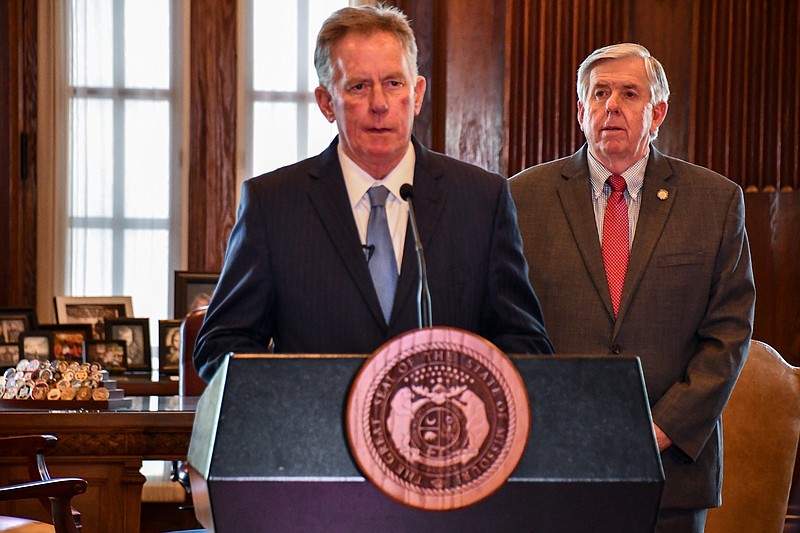 Dan Mehan, president and CEO of the Missouri Chamber of Commerce and Industry, speaks during a COVID-19 briefing Tuesday, April 28, 2020, as Missouri Gov. Mike Parson looks on.