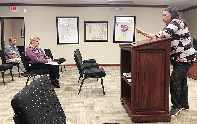 Mylene Dunn, of the Callaway County Health Department, discusses reopening plans with Holts Summit businesses.