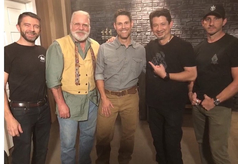 <p>Submitted</p><p>Russellville resident and hobbyist blacksmith Collin Steenbergen, center, is set to make an appearance tonight on the History Channel’s “Forged in Fire.” Steenbergen is joined here, from left, by show judges Ben Abbott, David Baker, Doug Marcaida and host Will Willis.</p>