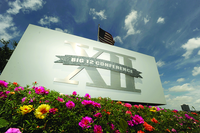 In this June 14, 2010, file photo, a Big 12 sign is seen outside the conference headquarters in Irving, Texas.