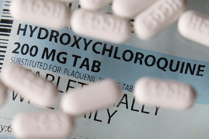 An arrangement of hydroxychloroquine tablets is seen April 6 in Las Vegas.