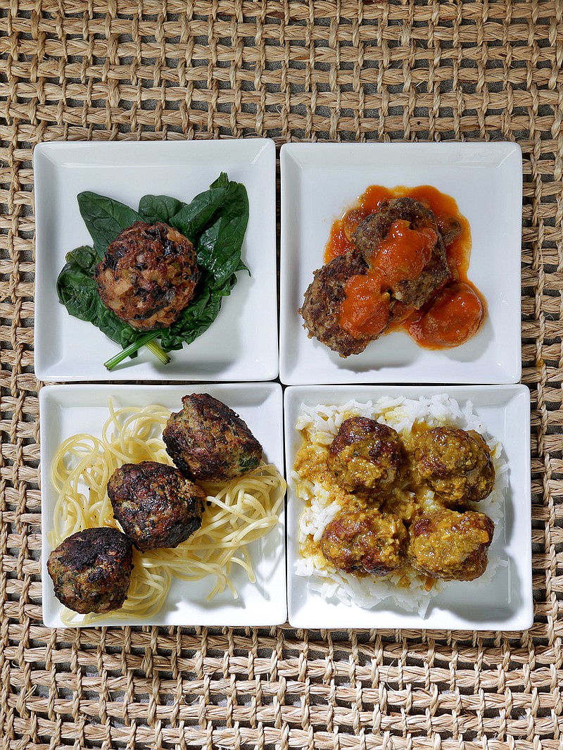 Meatballs: one, Lion's Head (Chinese Meatball); two, Beef boulettes with Financire Sauce; three, Chicken Meatballs and four, Meatballs in Almond Sauce. (Hillary Levin/St. Louis Post-Dispatch/TNS)