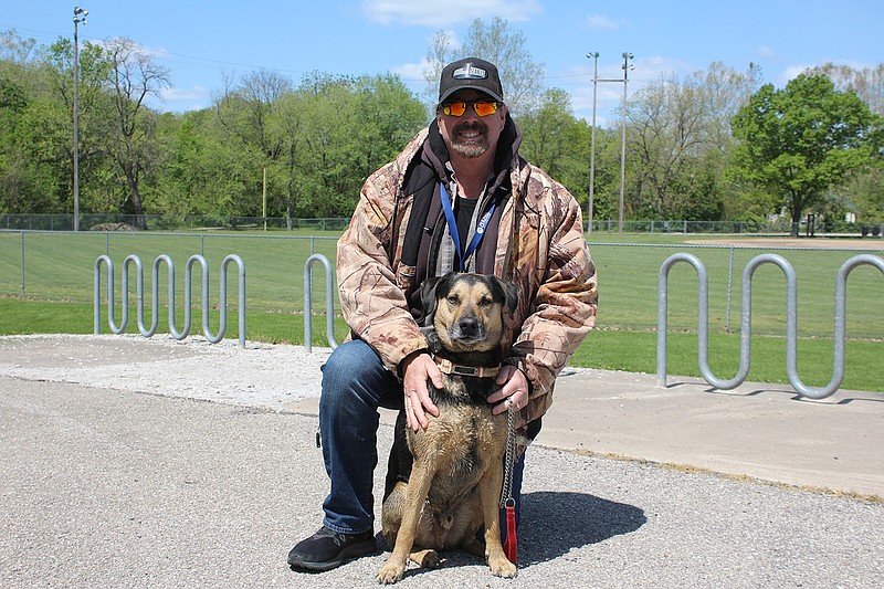 Doug Lewis and his dog Remmi