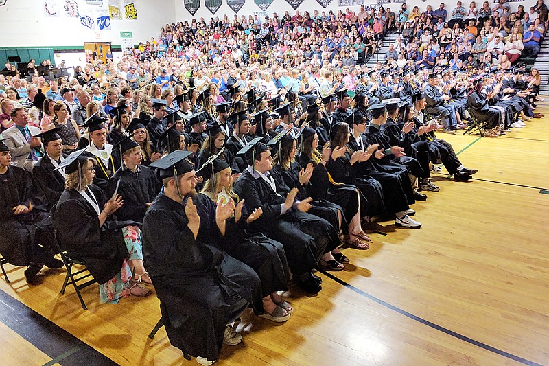 South Callaway's 2019 high school graduates participate in the annual ceremony last May. In response to COVID-19, many local schools are opting for outside graduation ceremonies. File photo