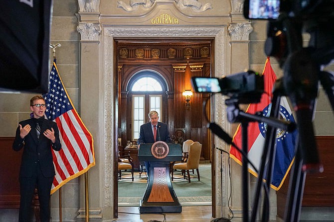 Missouri Gov. Mike Parson speaks during a COVID-19 briefing Thursday, May 14, 2020.