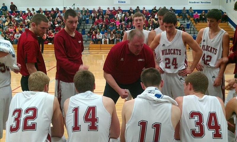 <p>Submitted</p><p>Greg Koetting, center, will be the new head coach for the Russellville Indians boys basketball team next season. Koetting takes the helm of a young Indians team that went 5-19 this year.</p>