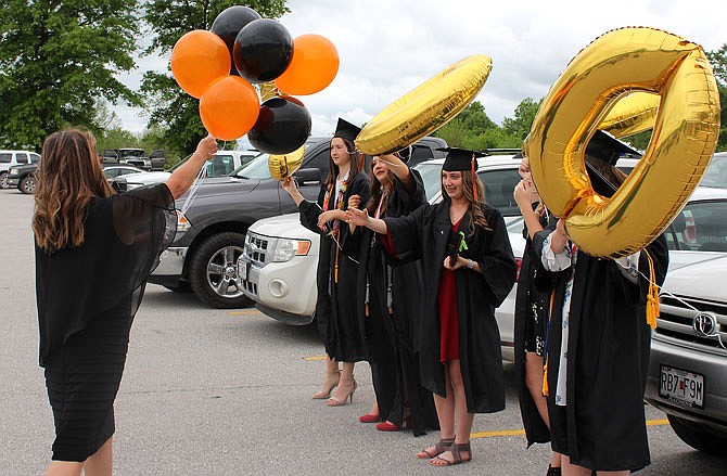 A group of New Bloomfield High School graduates celebrate the end of high school.