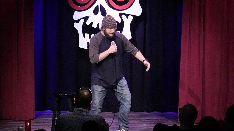 <p>Austin Usher performs his first stand up comedy set at The Laughing Skull.</p>