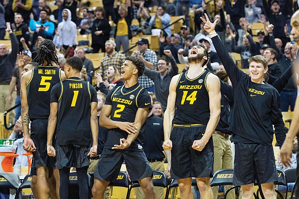 In this Jan. 11 file photo, Missouri players celebrate on the bench during the second half of a game against Florida at Mizzou Arena.