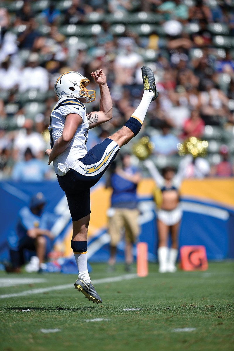 Chargers punter Tyler Newsome gets set to land following a kick during an Aug. 18, 2019, preseason game against the Saints in Carson, Calif. Newsome is in the running to replace former Chiefs punter Dustin Colquitt.