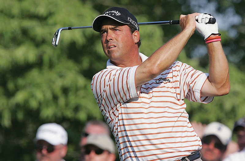 This June 18, 2005, file photo shows Olin Browne teeing off on the 18th hole during the third round of the U.S. Open in Pinehurst, N.C. 