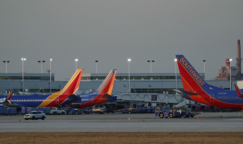 Southwest Airlines planes are parked at gates at Midway International Airport in Chicago on March 17, 2020. (John J. Kim/Chicago Tribune/TNS)