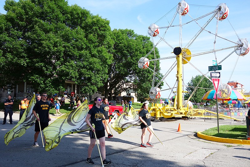 Unlike traditional parades — such as the 2019 Fulton Street Fair parade depicted here — Friday's parade honoring Fulton High School seniors won't feature floats, marching bands or thrown candy. Rather, graduating Hornets will drive through downtown Fulton in their vehicles, and spectators are encouraged to maintain social distancing while cheering them on.