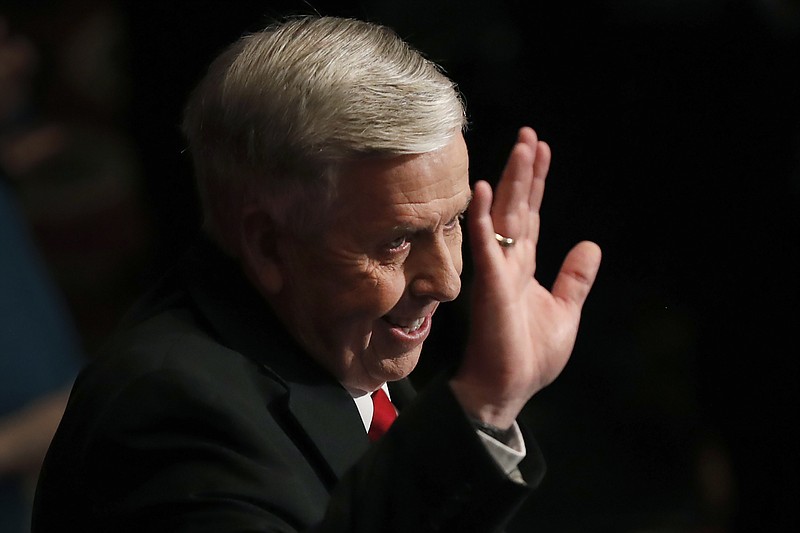 FILE - In this Jan. 15, 2020, file photo, Missouri Gov. Mike Parson waves as he concludes the State of the State address in Jefferson City, Mo. (AP Photo/Jeff Roberson, File)