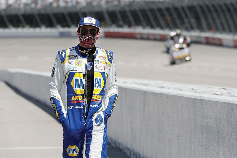 Chase Elliott walks to his car for the start of Sunday's NASCAR Cup Series race at Darlington Raceway in Darlington, S.C. 