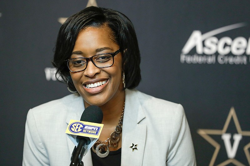 In this Feb. 5, 2020, file photo, Vanderbilt interim athletic director Candice Lee answers questions during a news conference in Nashville, Tenn. Vanderbilt has removed the interim title, making Candice Storey Lee the first black woman to become an athletic director in the Southeastern Conference. With Vanderbilt's announcement Wednesday, May 20, 2020, Lee now is among only five women in charge of a Power Five program. (AP Photo/Mark Humphrey, File)