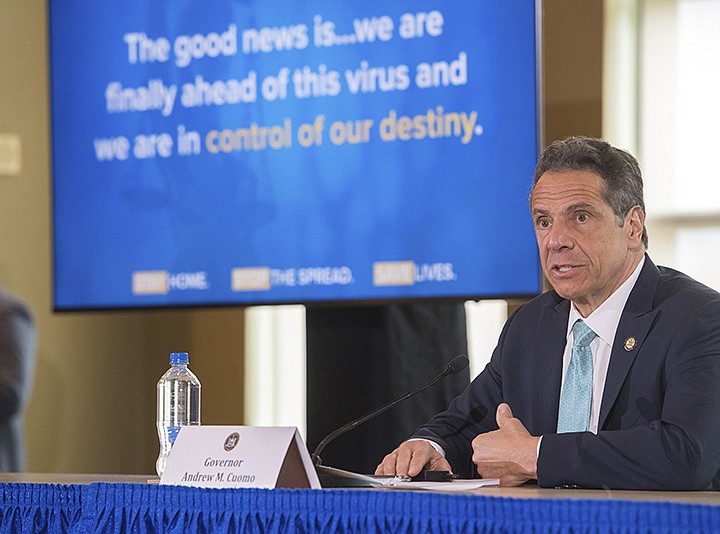 In this photo provided by the Office of Governor Andrew M. Cuomo, Gov. Cuomo briefs the media during a coronavirus news conference at Marist College, Friday, May 8, 2020, in Poughkeepsie, N.Y. (Darren McGee/Office of Governor Andrew M. Cuomo via AP)