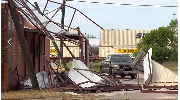 As seen in this picture taken from a video, storms carrying large hail and damaging winds, including a possible tornado, caused severe damage to parts of North Texas. The town of Bowie, about 65 miles northwest of Fort Worth, was hit hard by a storm while under a tornado warning Friday night. (May 23)