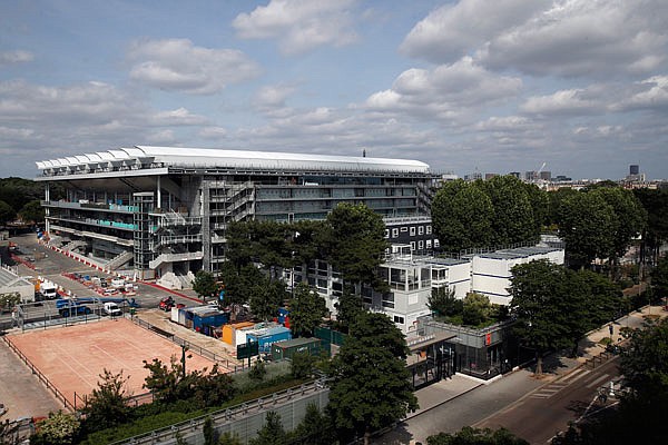 The Philippe-Chatrier tennis court with its retractable roof is pictured Sunday from a top building in Paris.