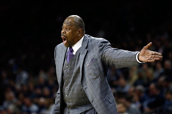 In this Jan. 11 file photo, Georgetown coach Patrick Ewing yells to his team during a game against Villanova in Philadelphia.