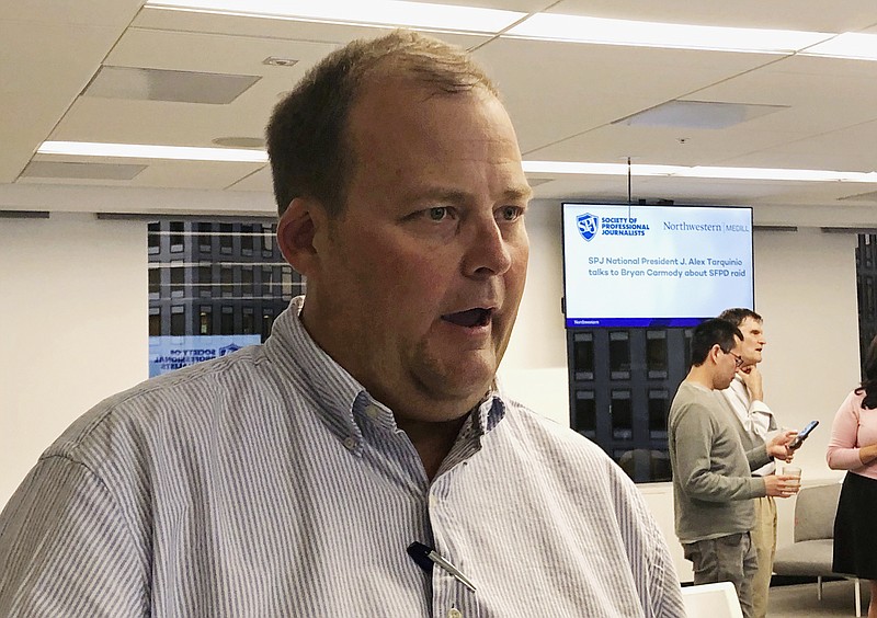 FILE - In this Aug. 13, 2019, file photo, freelance journalist Bryan Carmody attends a panel event held by the Society of Professional Journalists in San Francisco. San Francisco police have agreed to uphold press protections as part of a settlement with a freelance journalist whose home and office were raided by police a year ago in a bid to root out a confidential source. (AP Photo/Juliet Williams, File)