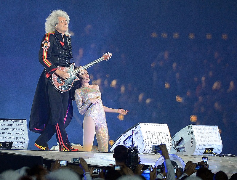 In this 2012 file image, Queen guitarist Brian May and Jessie J perform "We Will Rock You" at the Olympic Stadium in London, England, during the Closing Ceremony for the London 2012 Summer Olympic Games, Sunday, August 12, 2012. (Chuck Myers/MCT/TNS)