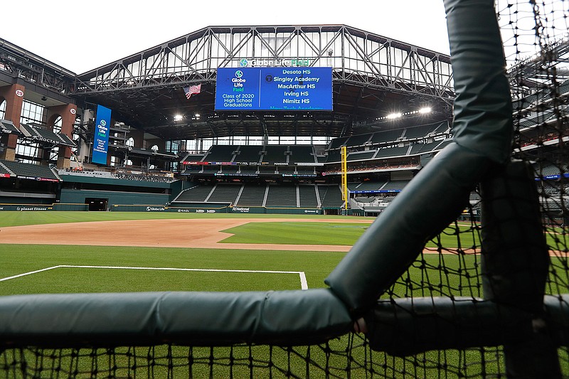 A view of the Globe Life Field, the newly-built home of the Texas Rangers, with the roof open from a perspective along the third base line is shown in Arlington, Texas, Wednesday, May 20, 2020. (AP Photo/Tony Gutierrez)