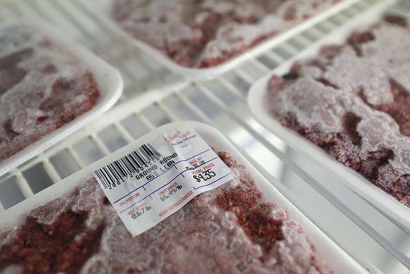 Packages of meat sit in a cooler at a local super market, Friday, May 29, 2020, in Des Moines, Iowa. As if trips to the grocery store weren't nerve-racking enough, shoppers lately have seen the costs of meat, eggs and even potatoes soar as the coronavirus has disrupted processing plants and distribution networks. (AP Photo/Charlie Neibergall)
