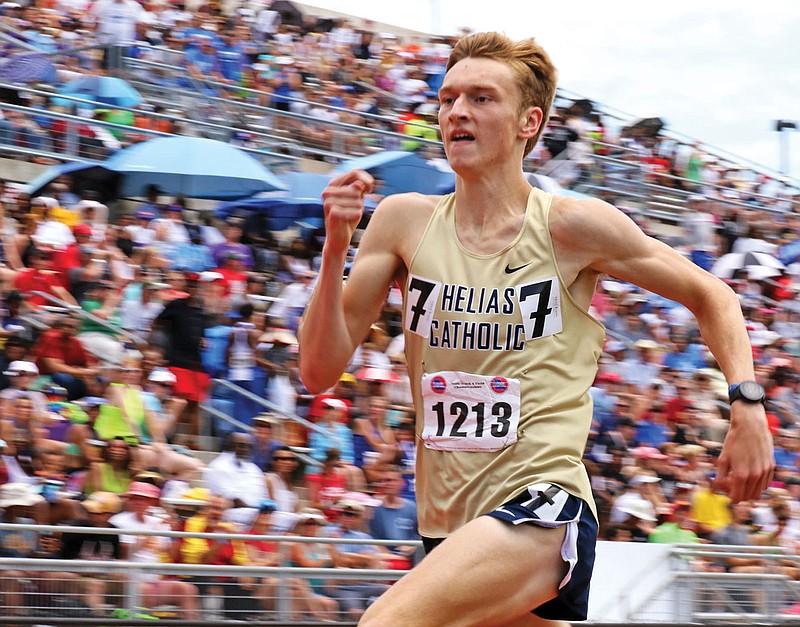 Jack Crull of Helias runs on the front straightaway during the 1,600-meter run during the 2018 Class 4 state track and field championships at Adkins Stadium. Crull was one of 11 Helias seniors who had their high school track and field career end because of the coronavirus.